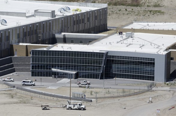 An aerial view of the NSA's Utah Data Center in Bluffdale, Utah, Thursday, June 6, 2013. The government is secretly collecting the telephone records of millions of U.S. customers of Verizon under a top-secret court order, according to the chairwoman of the Senate Intelligence Committee. The Obama administration is defending the National Security Agency's need to collect such records, but critics are calling it a huge over-reach. (AP Photo/Rick Bowmer)